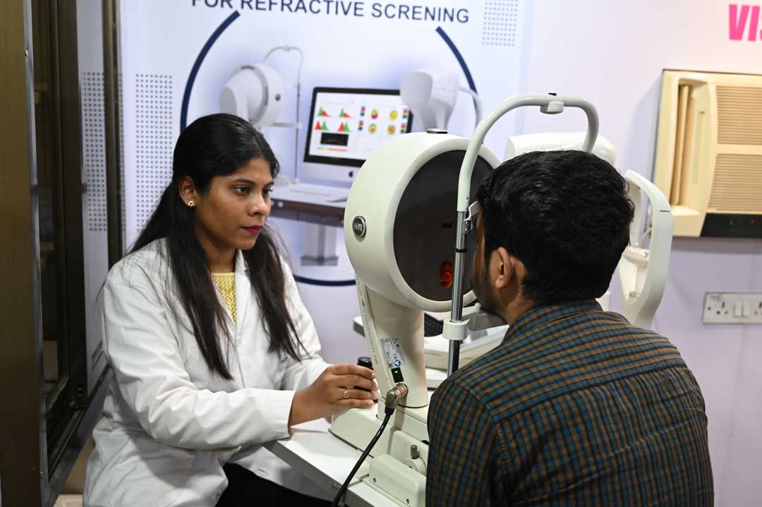 Eye specialist examining a patient
