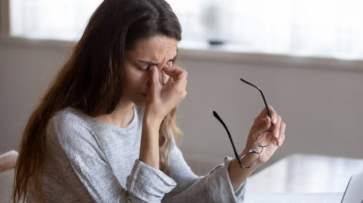 Eye specialist evaluating persistent eye twitching